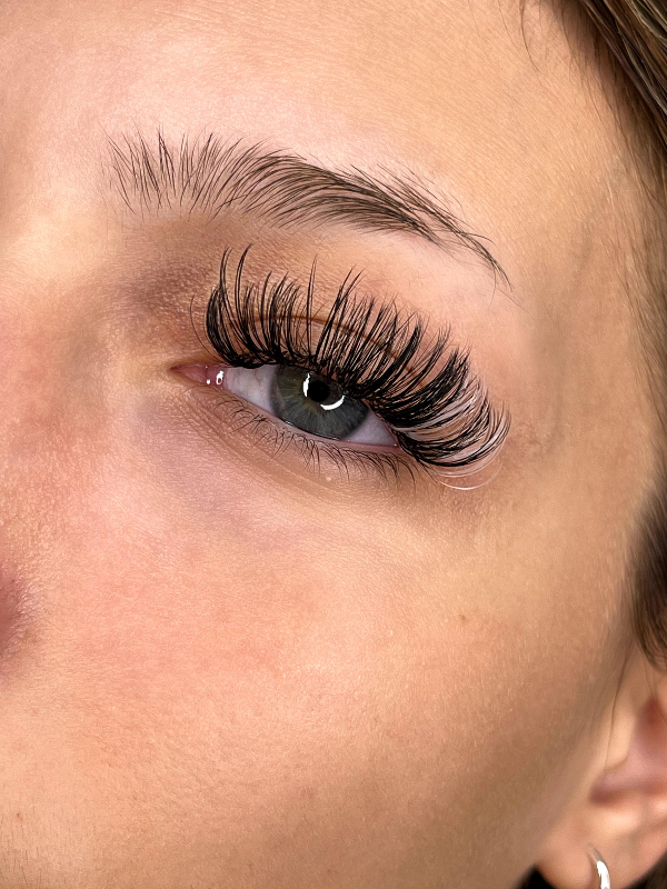 Lash extensions on a client, side view